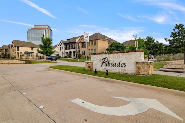 community sign featuring a residential view