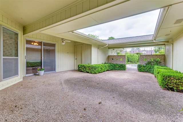 view of patio with visible vents and fence