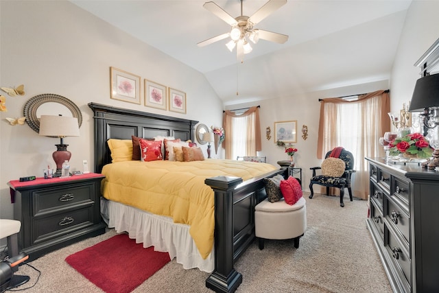 bedroom with a ceiling fan, lofted ceiling, and light carpet