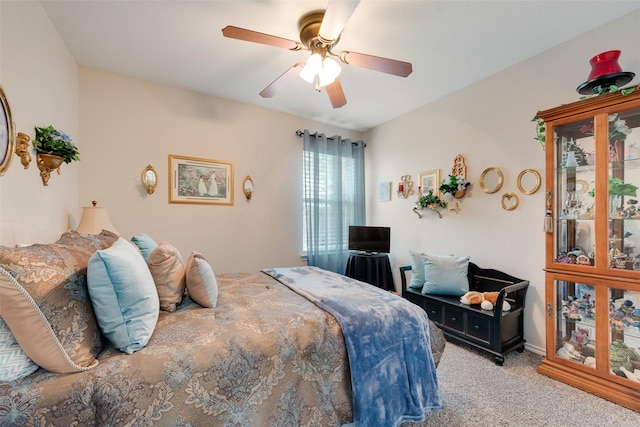 carpeted bedroom with a ceiling fan