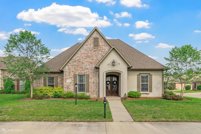 1113 Cypress Creek Cir, Shreveport, LA 71106 - french provincial home featuring brick siding, a shingled roof, french doors, and a front yard