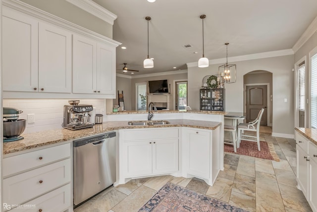 1113 Cypress Creek Cir, Shreveport, LA 71106 - kitchen featuring crown molding, a peninsula, arched walkways, a sink, and dishwasher