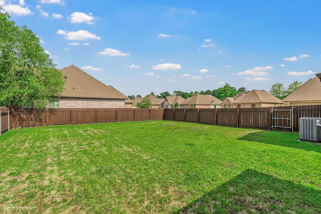1113 Cypress Creek Cir, Shreveport, LA 71106 - view of yard featuring central air condition unit, a residential view, and a fenced backyard
