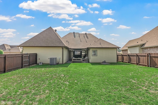 1113 Cypress Creek Cir, Shreveport, LA 71106 - rear view of house with a yard, central AC unit, a fenced backyard, and roof with shingles