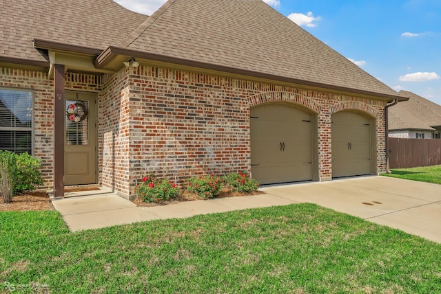 1113 Cypress Creek Cir, Shreveport, LA 71106 - view of front of home with brick siding, an attached garage, and roof with shingles