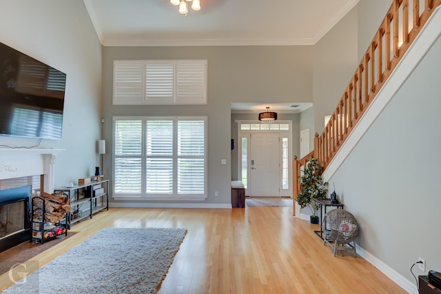 3666 Crestview Dr, Shreveport, LA 71119 - entryway featuring baseboards, ornamental molding, and wood finished floors