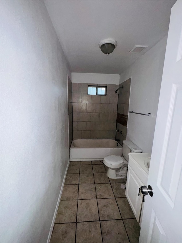 7539 Red Bud Dr, Dallas, TX 75227 - full bathroom with shower / tub combination, vanity, toilet, tile patterned floors, and baseboards