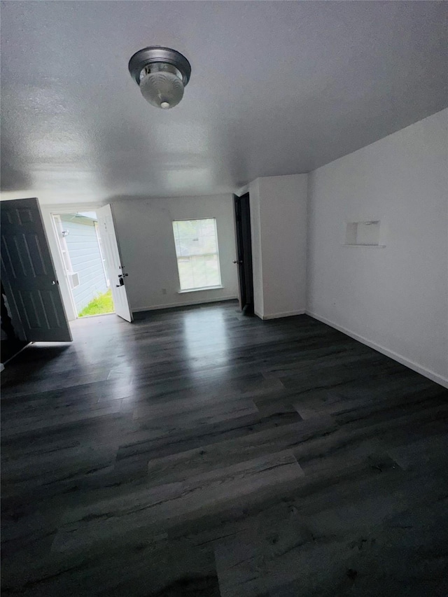 7539 Red Bud Dr, Dallas, TX 75227 - interior space featuring baseboards and dark wood-style floors