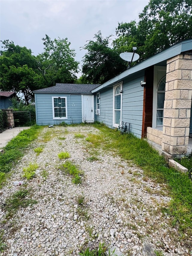 7539 Red Bud Dr, Dallas, TX 75227 - view of rear view of house