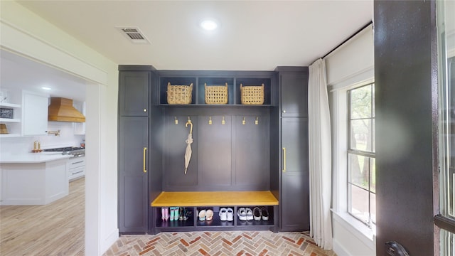 mudroom featuring visible vents and recessed lighting