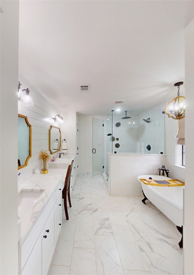 full bathroom featuring double vanity, visible vents, a shower stall, a sink, and marble finish floor