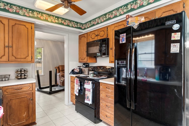 kitchen featuring light countertops, a ceiling fan, black appliances, and brown cabinetry