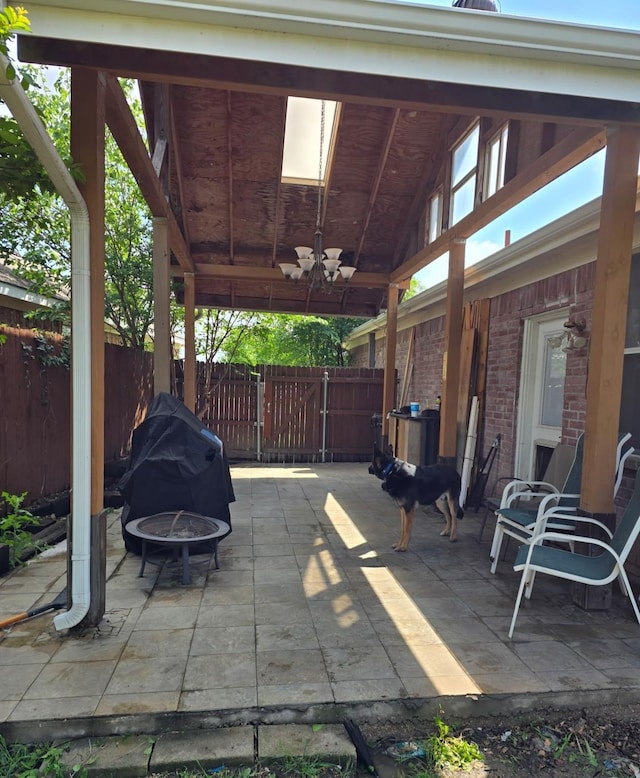 4444 Park Creek Ct, Fort Worth, TX 76137 - view of patio with a ceiling fan, a fire pit, fence, and grilling area