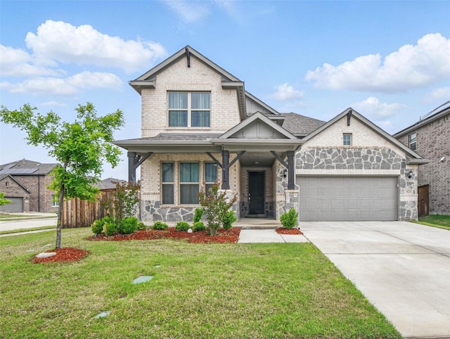 craftsman inspired home featuring brick siding, a front lawn, concrete driveway, an attached garage, and stone siding