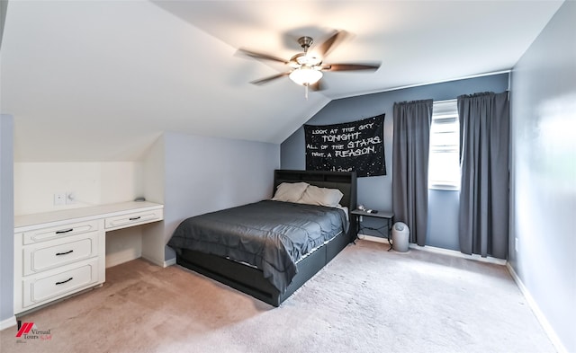 bedroom with a ceiling fan, baseboards, light colored carpet, and lofted ceiling