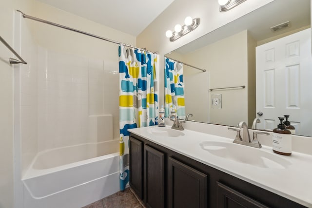 bathroom with a sink, shower / bath combination with curtain, double vanity, and visible vents