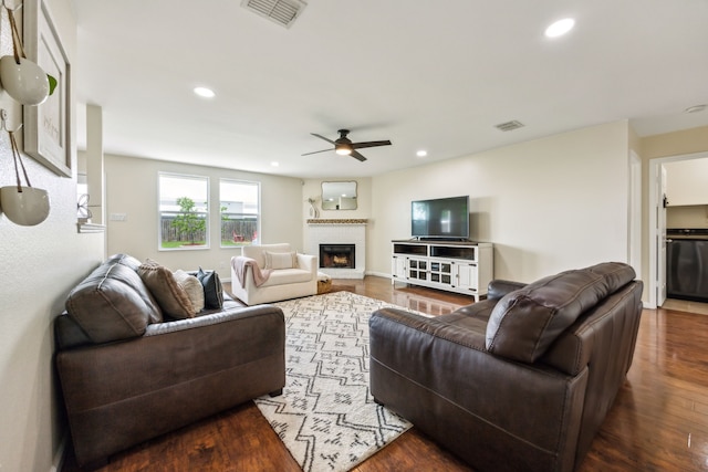 living room featuring a ceiling fan, recessed lighting, and visible vents