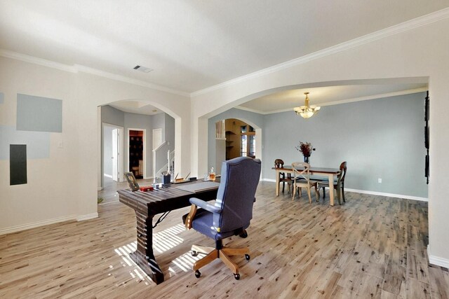 3017 Holford Rd, Richardson, TX 75082 - office area featuring light wood-type flooring, baseboards, a chandelier, arched walkways, and ornamental molding