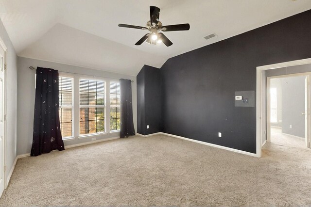 3017 Holford Rd, Richardson, TX 75082 - unfurnished bedroom featuring carpet, vaulted ceiling, baseboards, and a ceiling fan