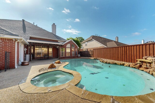 3017 Holford Rd, Richardson, TX 75082 - view of pool with a fenced backyard, a patio area, and a pool with connected hot tub