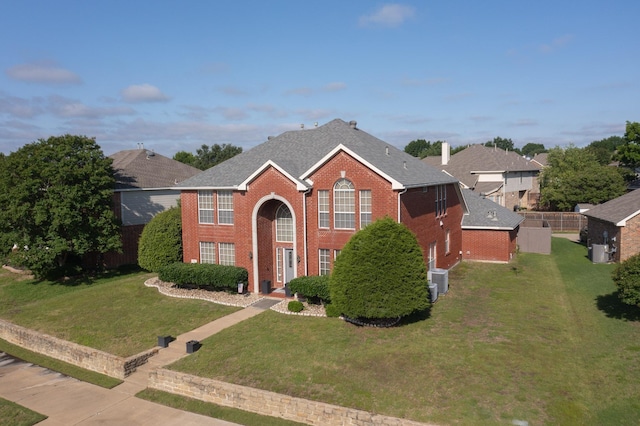 3017 Holford Rd, Richardson, TX 75082 - traditional-style house featuring brick siding and roof with shingles