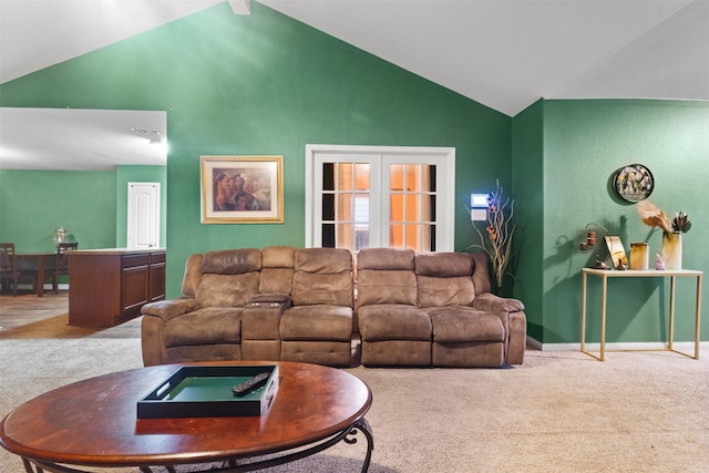 living room featuring high vaulted ceiling, visible vents, baseboards, and carpet