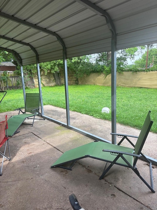 view of home's community featuring a patio, a fenced backyard, and a yard