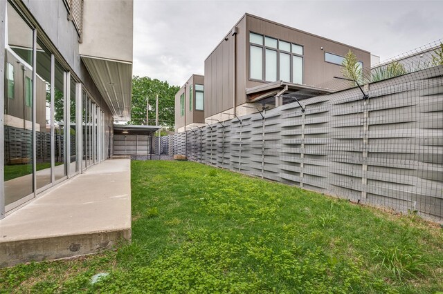 view of yard with a patio and fence
