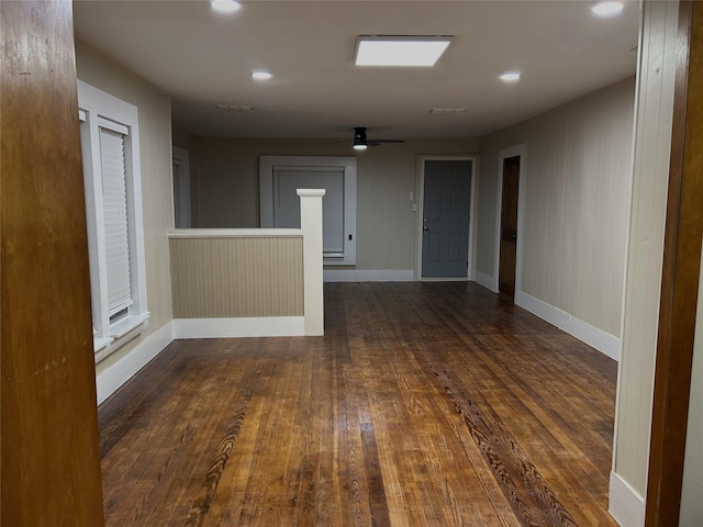 spare room featuring recessed lighting, baseboards, ceiling fan, and wood finished floors