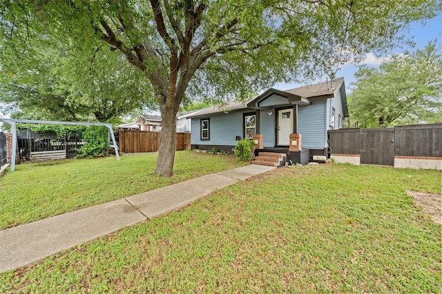 2301 Connor Ave, Waco, TX 76706 - view of front of home with a fenced backyard and a front lawn