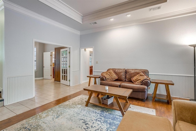 7116 Westover Dr, Granbury, TX 76049 - living area with crown molding, recessed lighting, visible vents, and light wood-type flooring