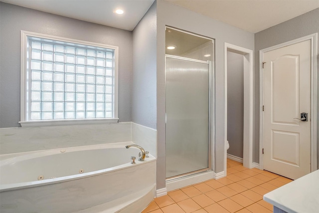 7116 Westover Dr, Granbury, TX 76049 - bathroom featuring toilet, a tub with jets, tile patterned flooring, and a stall shower