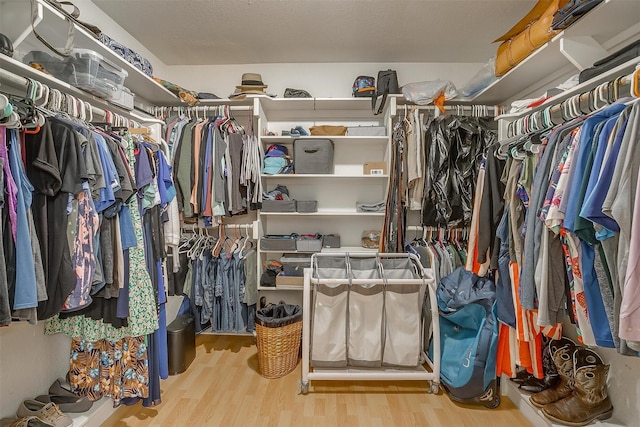 7116 Westover Dr, Granbury, TX 76049 - spacious closet with wood finished floors