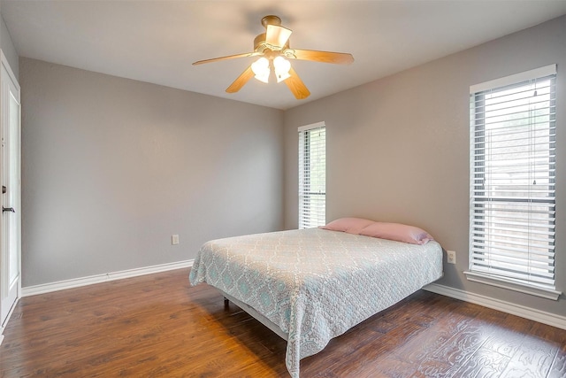 7116 Westover Dr, Granbury, TX 76049 - bedroom featuring baseboards, a ceiling fan, and wood finished floors