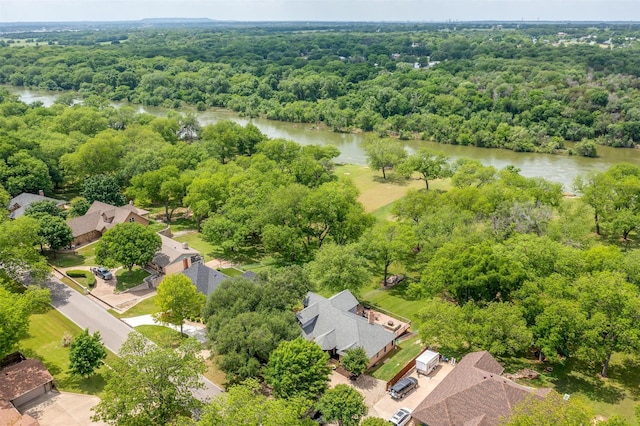 7116 Westover Dr, Granbury, TX 76049 - birds eye view of property featuring a water view, a residential view, and a wooded view