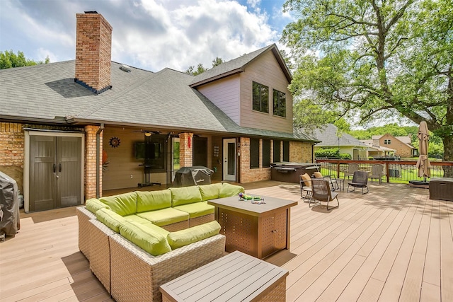 7116 Westover Dr, Granbury, TX 76049 - wooden deck with outdoor lounge area and a hot tub