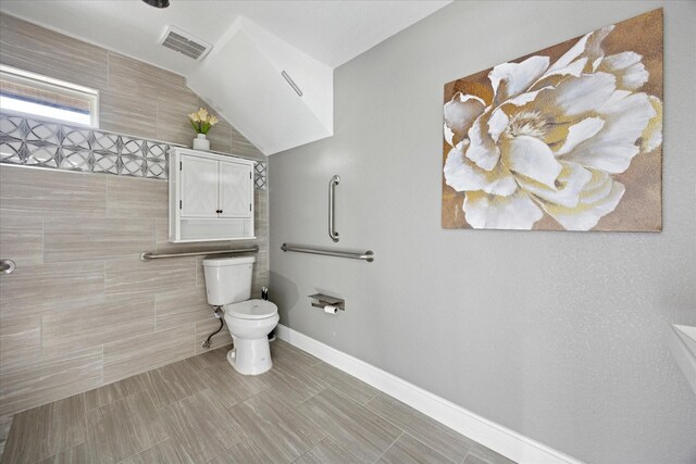 3001 Hurstview Dr, Hurst, TX 76054 - bathroom featuring baseboards and toilet