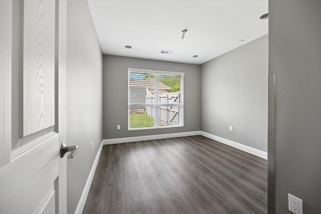 3001 Hurstview Dr, Hurst, TX 76054 - unfurnished room with dark wood-style floors and baseboards