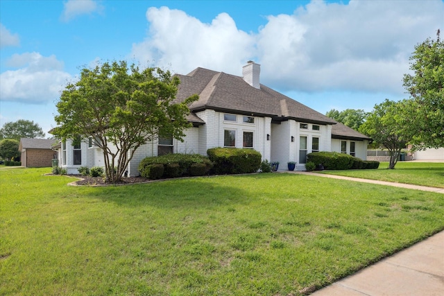 3001 Hurstview Dr, Hurst, TX 76054 - french country style house with a front lawn, a chimney, and roof with shingles