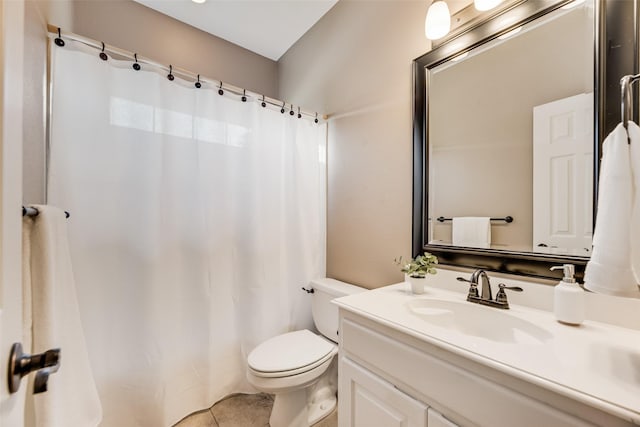 full bathroom featuring vanity, a shower with shower curtain, tile patterned floors, and toilet