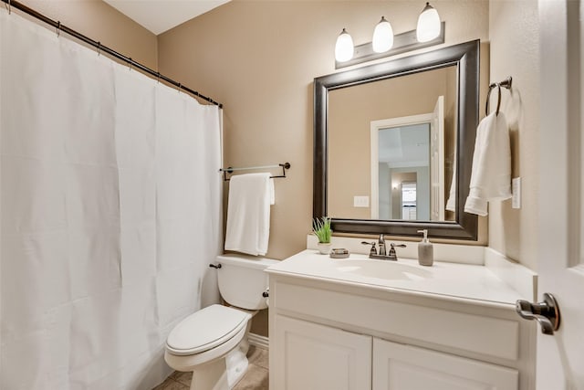bathroom featuring vanity, tile patterned floors, curtained shower, and toilet