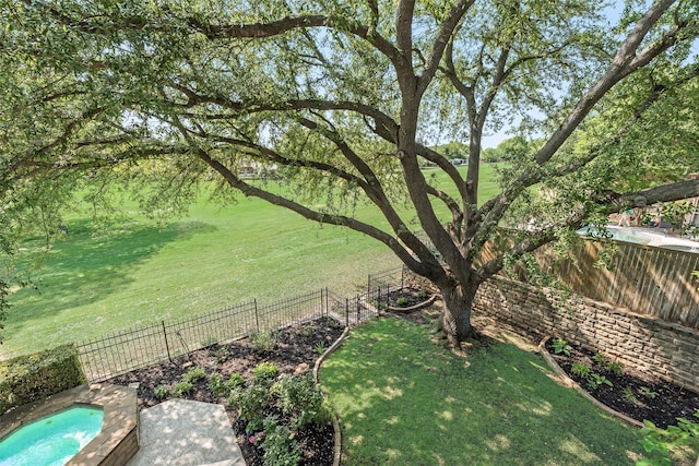 view of yard with a fenced backyard