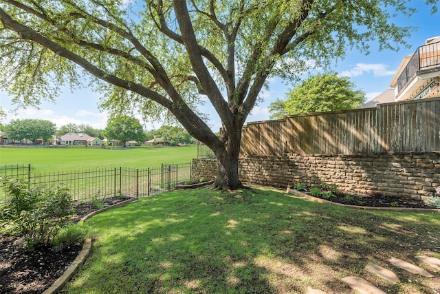 view of yard with fence