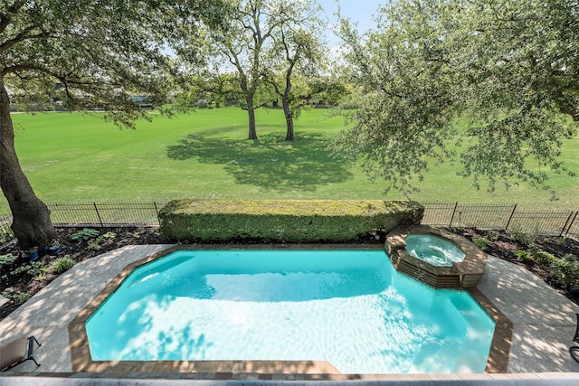 view of swimming pool featuring a pool with connected hot tub, a fenced backyard, and golf course view