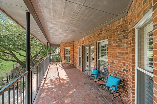 view of patio featuring french doors