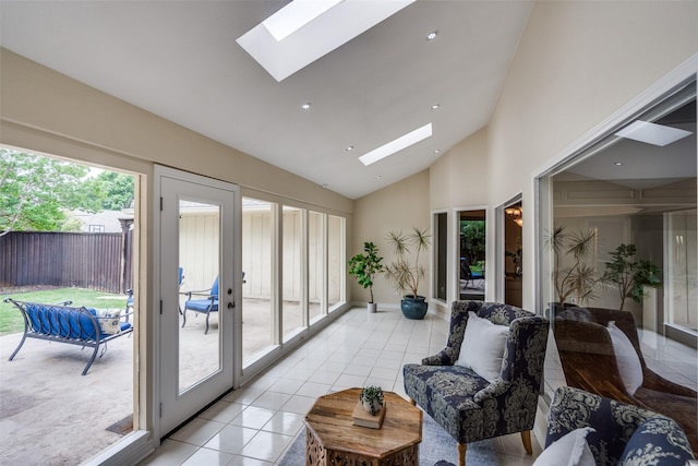 sunroom featuring a skylight and french doors