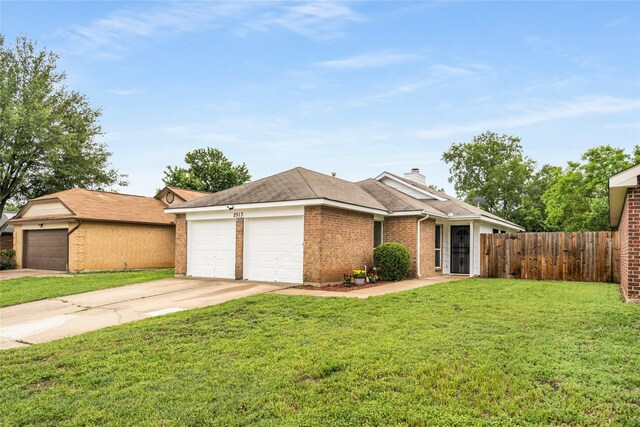 ranch-style house featuring fence, a front lawn, brick siding, a garage, and driveway