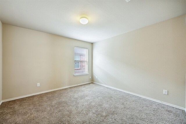 994 Decker Dr, Fate, TX 75189 - spare room featuring carpet floors and baseboards
