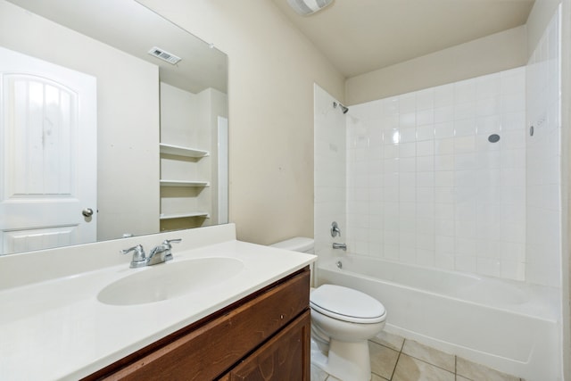 994 Decker Dr, Fate, TX 75189 - bathroom featuring toilet, tile patterned flooring, vanity, and shower / bathtub combination