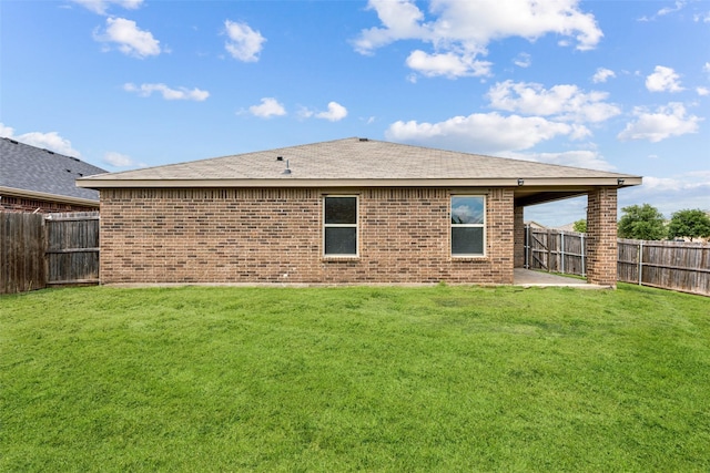 994 Decker Dr, Fate, TX 75189 - rear view of property with brick siding, a patio area, and a shingled roof